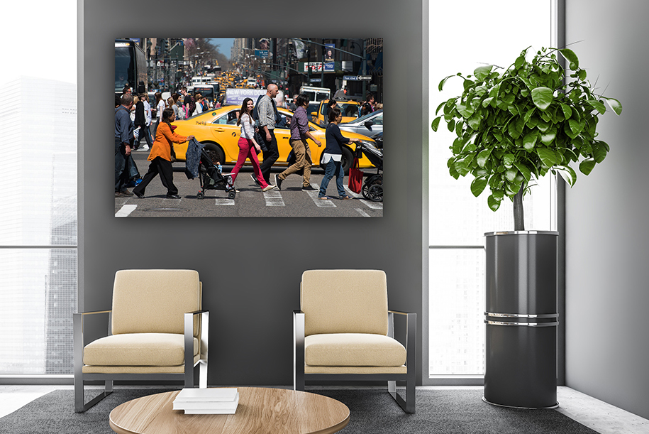 crowded new york city crosswalk print hanging in an office reception