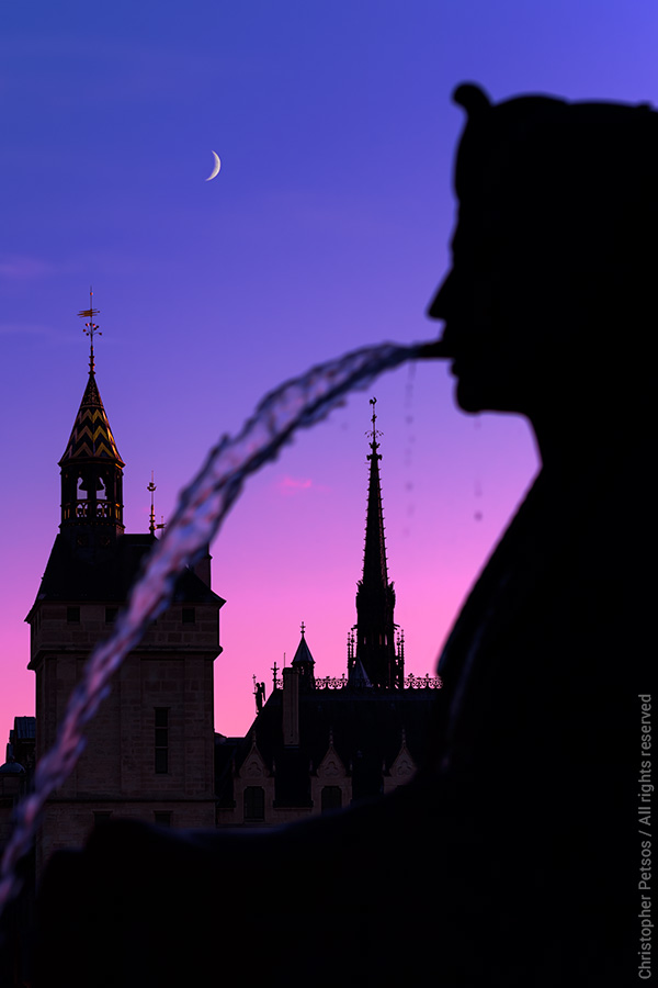 Christopher Petsos photography print of the Paris Fountain du Palmier with spires in the background