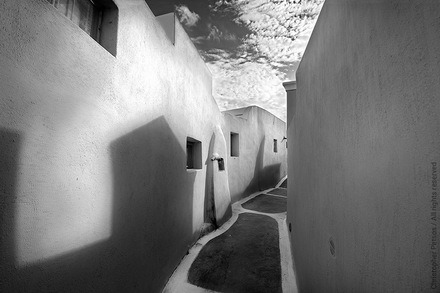 dramatic black and white of cycladic architecture in a villlage in Greece