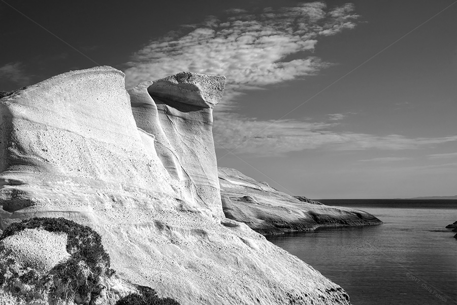 Rock tower and volcanic structures of Sarakiniko in Milos, in black and white