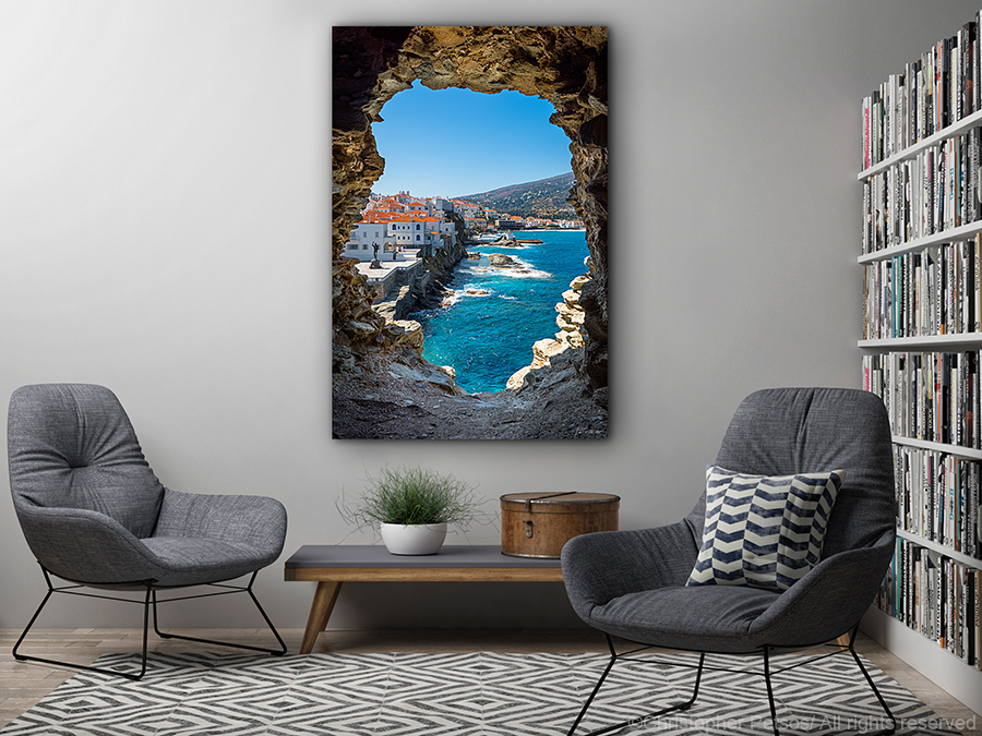 Christopher Petsos Fine art photo print of the view over Andros, Greece looking through the ruins of the old Venetian castle with a town on the water 