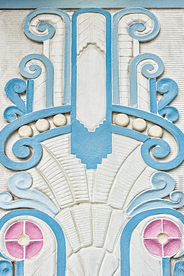geometric Miami art deco stlye architectural relief in blue and pink