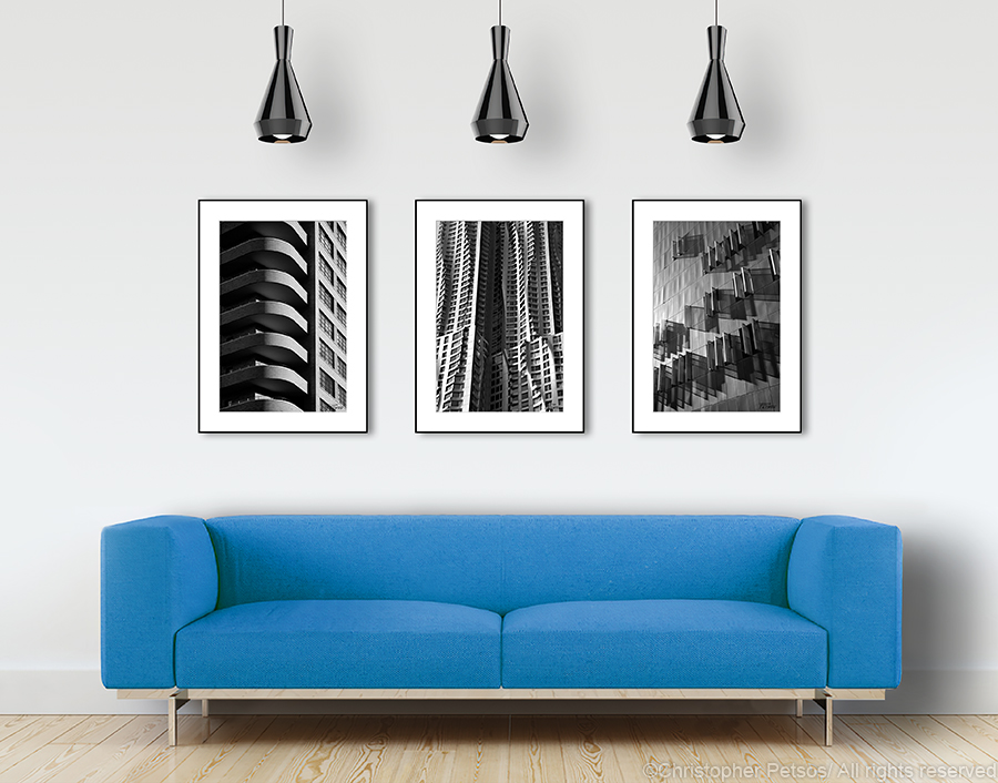 Architectural facade prints by Christopher Petsos hanging in an office reception